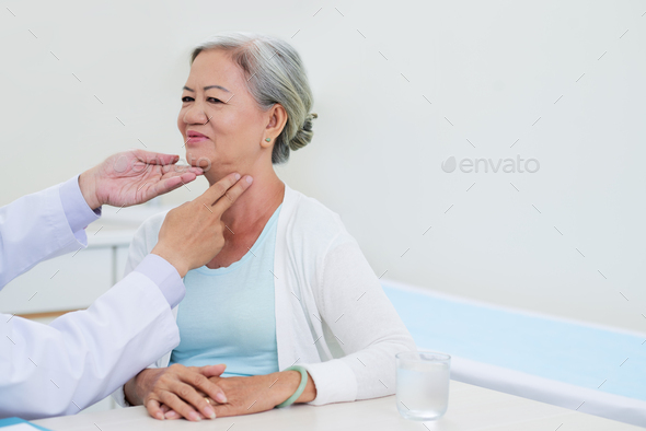 Thyroid check-up - Stock Photo - Images