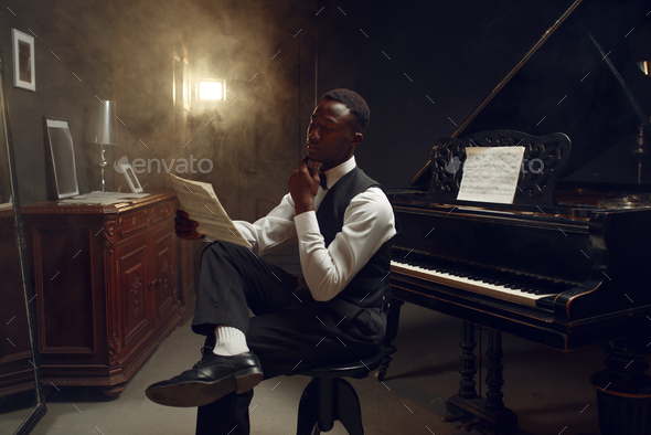Stylish black grand piano player, jazz performance - Stock Photo - Images