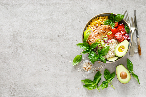 Buddha lunch bowl with grilled chicken breast, vegetables, basil salad and rice, healthy eating - Stock Photo - Images