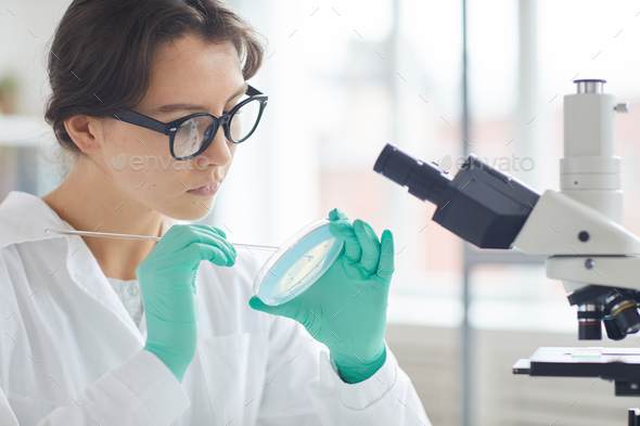 Beautiful Woman Testing Cosmetics in Lab