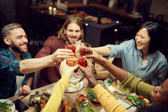 Multi-Ethnic Group of People Clinking Glasses