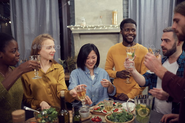 Diverse Group of People Enjoying Dinner Party