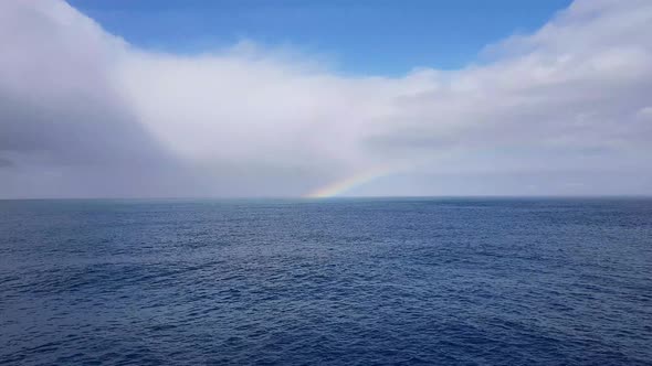 Rainbow in the Ocean After Rain and Thunderstorms alt