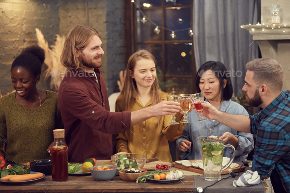 Diverse Group of People Toasting at Party