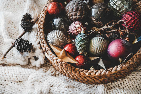 Christmas glass decoration toys and balls in basket - Stock Photo - Images