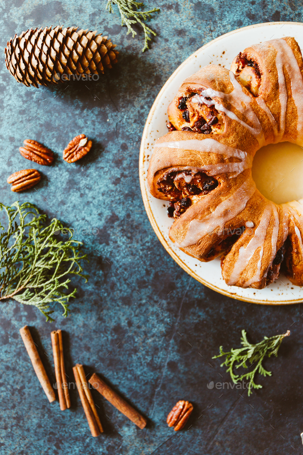 Creative flat lay, top view of Swedish tea ring Christmas cake - Stock Photo - Images