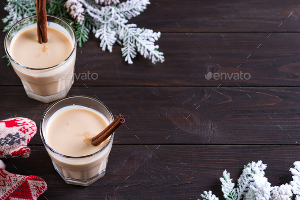 Eggnog Gemadinha is an alcoholic beverage or cocktail on dark wooden background, Christmas dinner