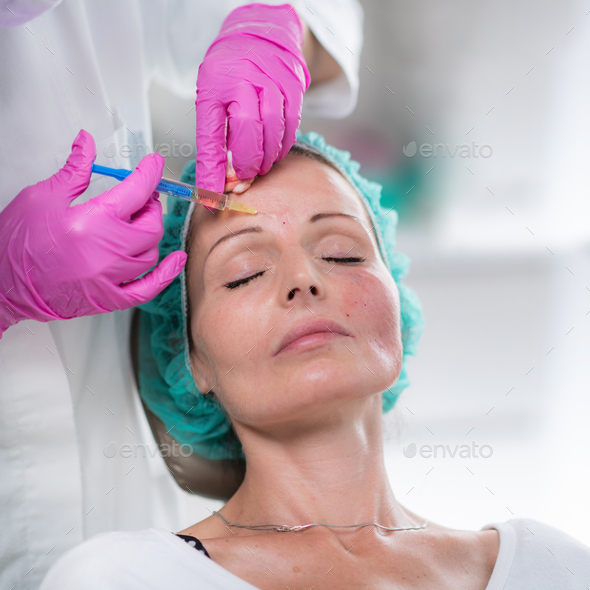 Hyaluronic Acid Injection Fillers for Forehead Stock Photo by microgen
