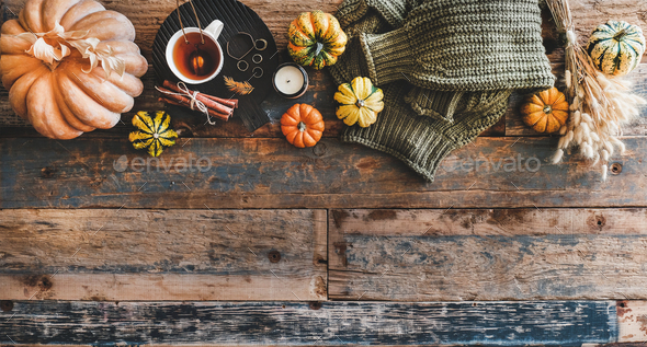 Green sweater and accessories over rustic wooden background, copy space - Stock Photo - Images