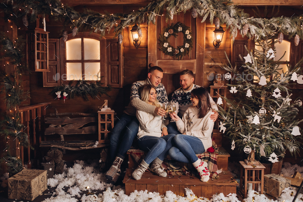 Two married couples are friends a Happy New Year - Stock Photo - Images