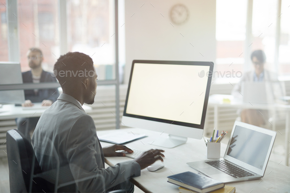 African-American Businessman at Workplace - Stock Photo - Images