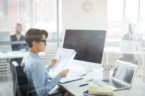 Female Office Wporker at Workplace - Stock Photo - Images