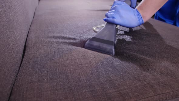 Home and Office Cleaning Concept. Professional Wet Sofa Cleaning alt
