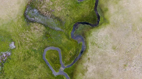 Aerial View of Green Land and Small Curve River in Aspen Springs alt