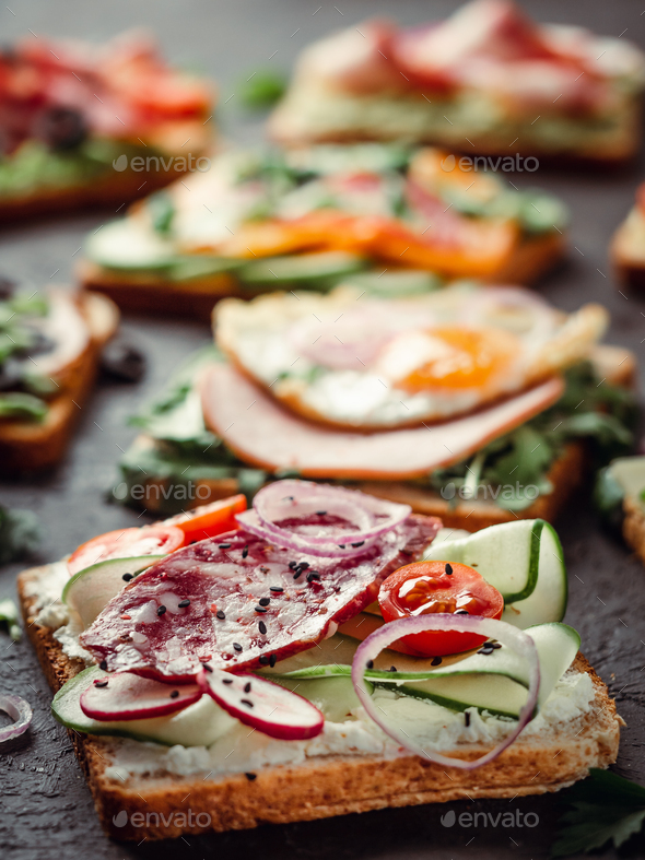 sandwiches with salami, vegetables and black sesame - Stock Photo - Images