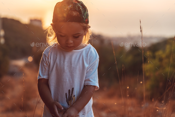 Cute little boy on the walk - Stock Photo - Images