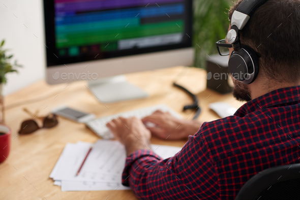 Man composing a song - Stock Photo - Images