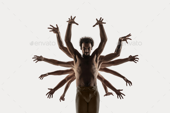 The group of modern ballet dancers. Contemporary art ballet. Young flexible athletic men and women - Stock Photo - Images