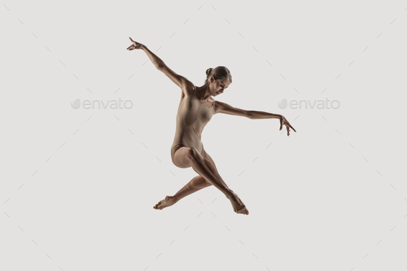 Modern ballet dancer. Contemporary art ballet. Young flexible athletic woman - Stock Photo - Images