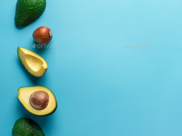 Avocado With Copy Space Top View Blue Background Stock Photo By Fasci