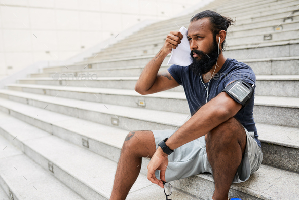 Tired Runner After Workout - Stock Photo - Images