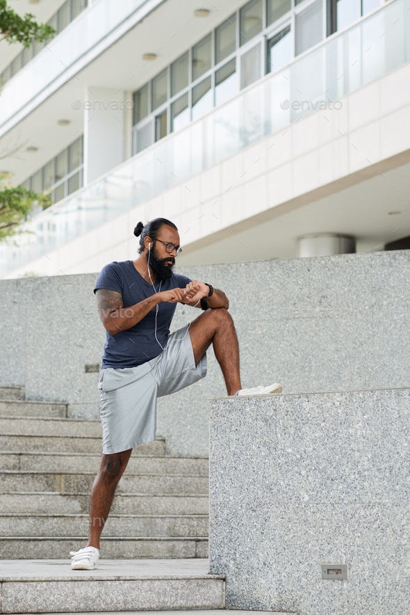 Bearded Athlete Warming Up - Stock Photo - Images