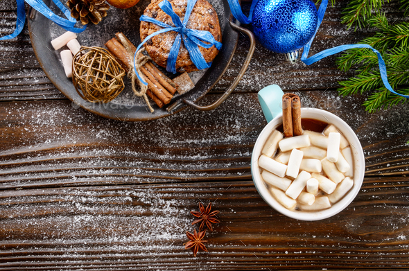 Flat lay Christmas background of blue mug with hot chocolate and - Stock Photo - Images