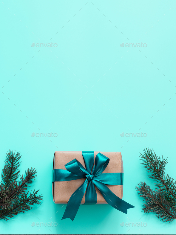 Gift box in craft paper and satin ribbon - Stock Photo - Images