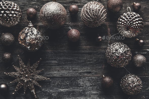 Christmas or New Year background. Vintage Christmas tree toy decoration balls over wooden background - Stock Photo - Images