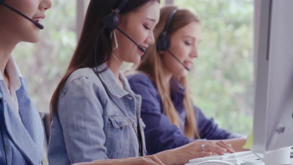 Customer Support Agent or Call Center with Headset Talking to Customer on Phone alt
