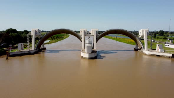 Lock and weir In Dutch River Lek Called Sluice Hagestein, aerial alt