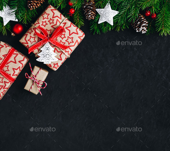 Download Christmas Background With Fir Branches And A Gift Box With A Red Bow On A Dark Concrete Background Stock Photo By Nblxer PSD Mockup Templates