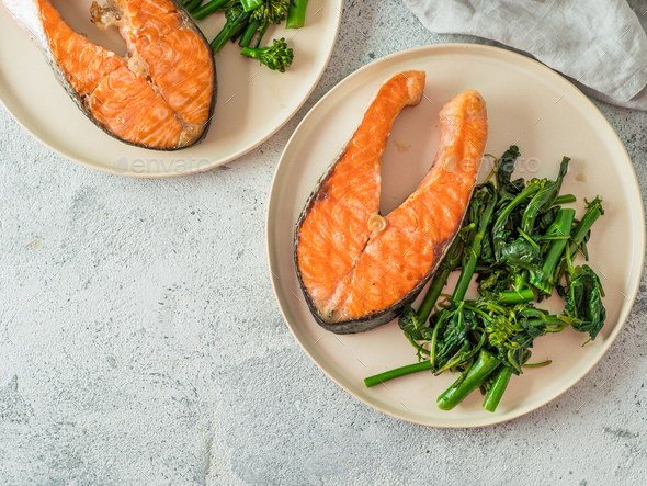 Ready-to-eat grilled salmon steak and greens - Stock Photo - Images
