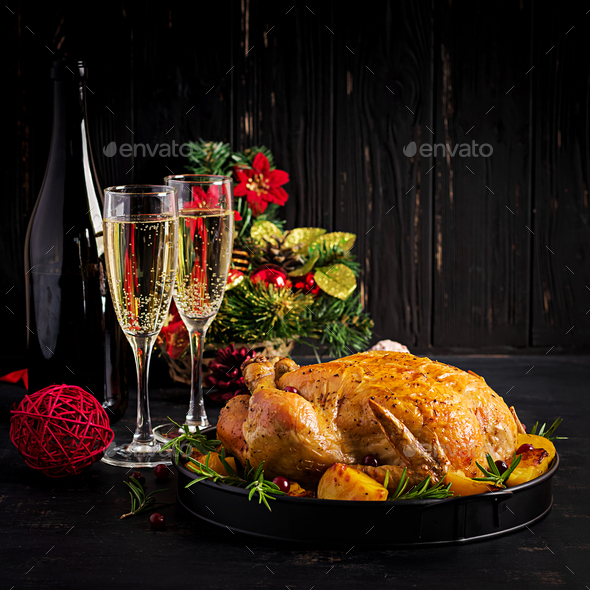 Baked turkey or chicken. The Christmas table is served with a tu - Stock Photo - Images