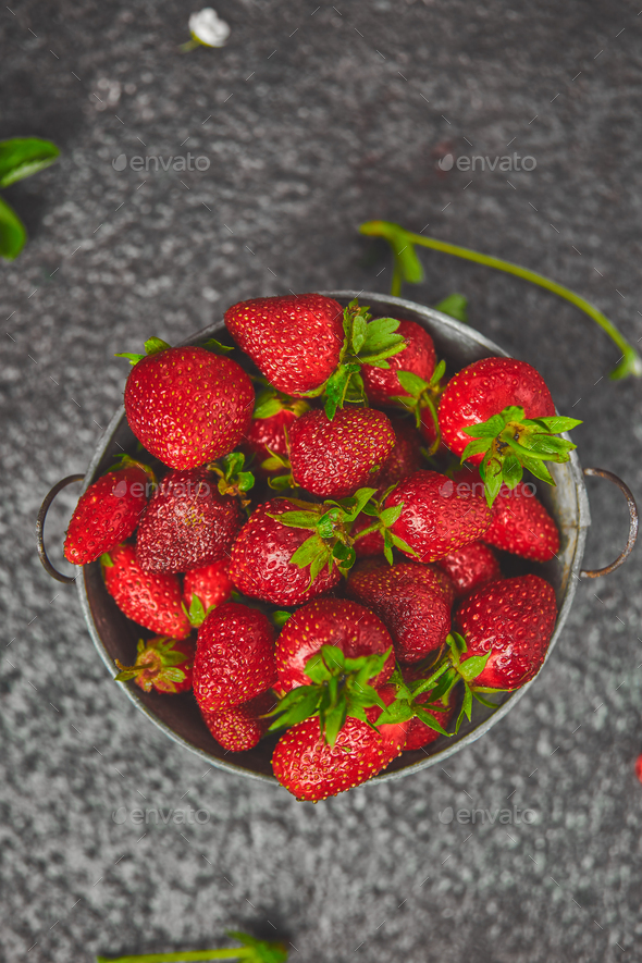 Strawberries in grey bowl. Fresh strawberries. Beautiful strawberries. - Stock Photo - Images