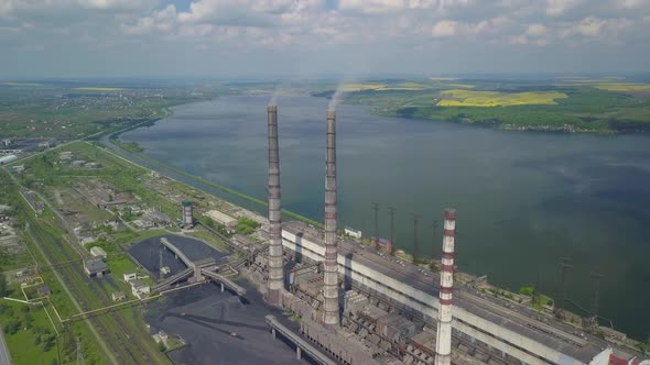 Thermal Power Plant on the Background of an Artificial Reservoir. Video From the Drone, Electricity