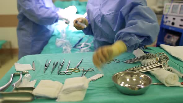 Surgieon  Doing Surgery In Operating Theatre