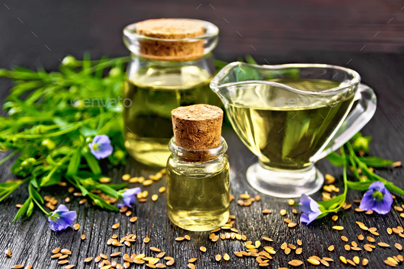 Oil flaxseed on board - Stock Photo - Images