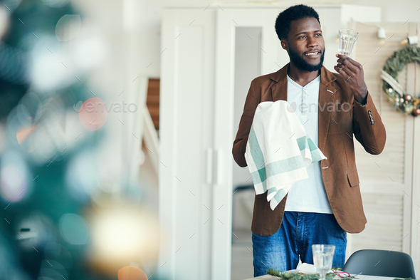 African Man Preparing for Christmas Dinner - Stock Photo - Images
