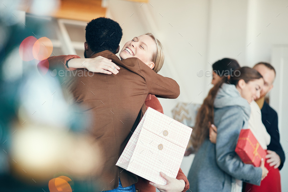 Welcoming Guests for Christmas Party - Stock Photo - Images