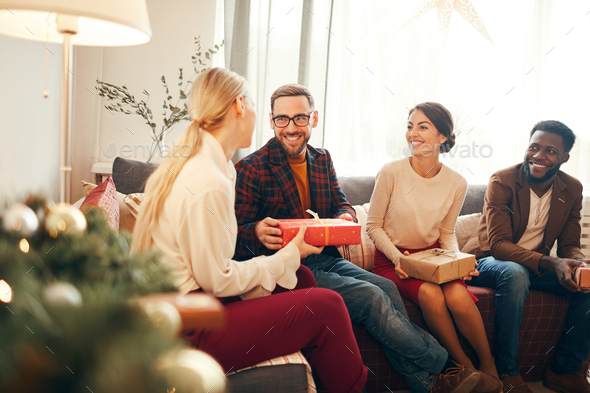 Presenting Christmas Gift - Stock Photo - Images