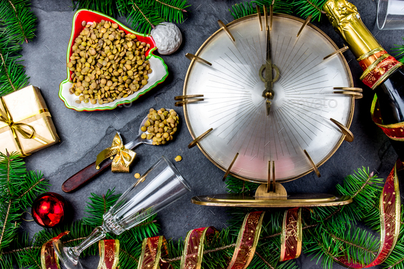 Hispanic New year eve tradition eat spoon of lentil - Stock Photo - Images