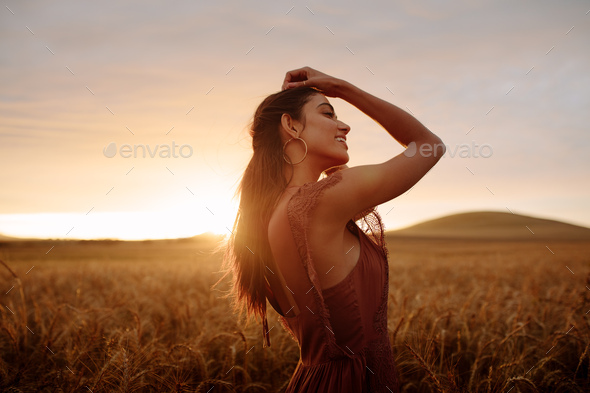 Woman enjoying a day in nature - Stock Photo - Images