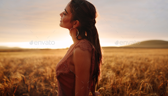 Woman enjoying countryside fresh air - Stock Photo - Images