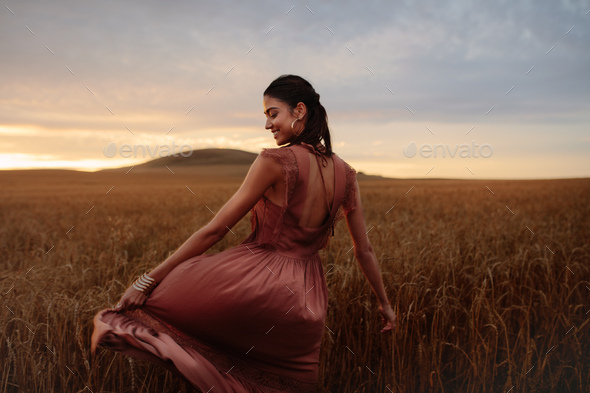 Rejoicing her freedom in nature - Stock Photo - Images