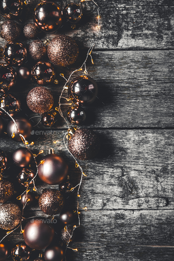 Christmas or New Year background. Vintage Christmas tree toy decoration balls and light garland - Stock Photo - Images