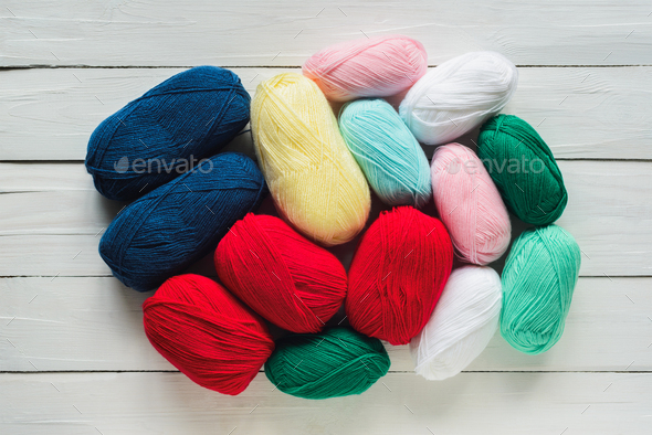 colorful oval acrylic yarn wool thread skeins - Stock Photo - Images