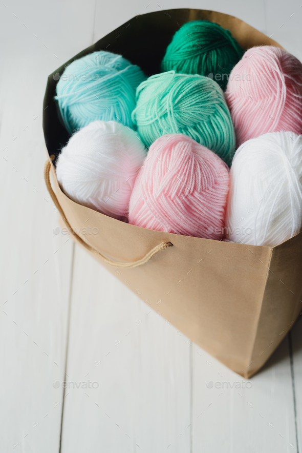 oval acrylic wool yarn thread skeins with kraft package - Stock Photo - Images