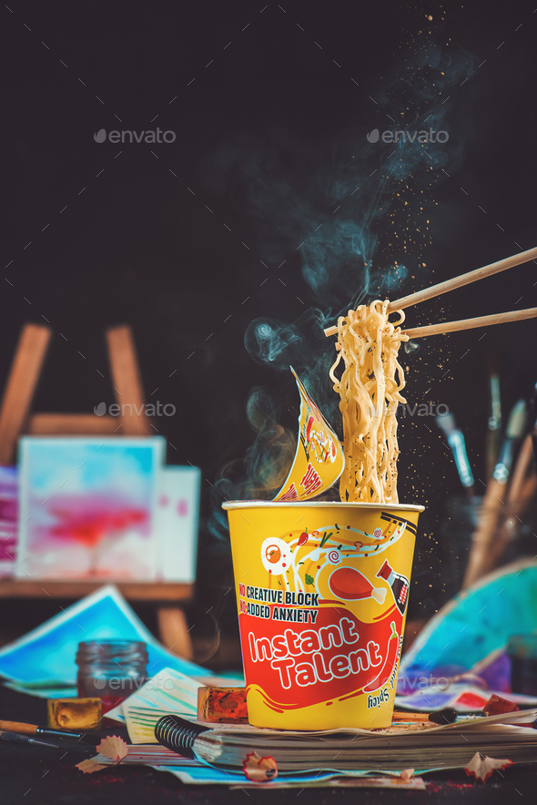 Instant ramen paper cup with chopsticks and Instant Talent label. Inspiration and creativity concept