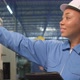 Female engineer inspects machine&#39;s control panel in manufacture factory. - VideoHive Item for Sale